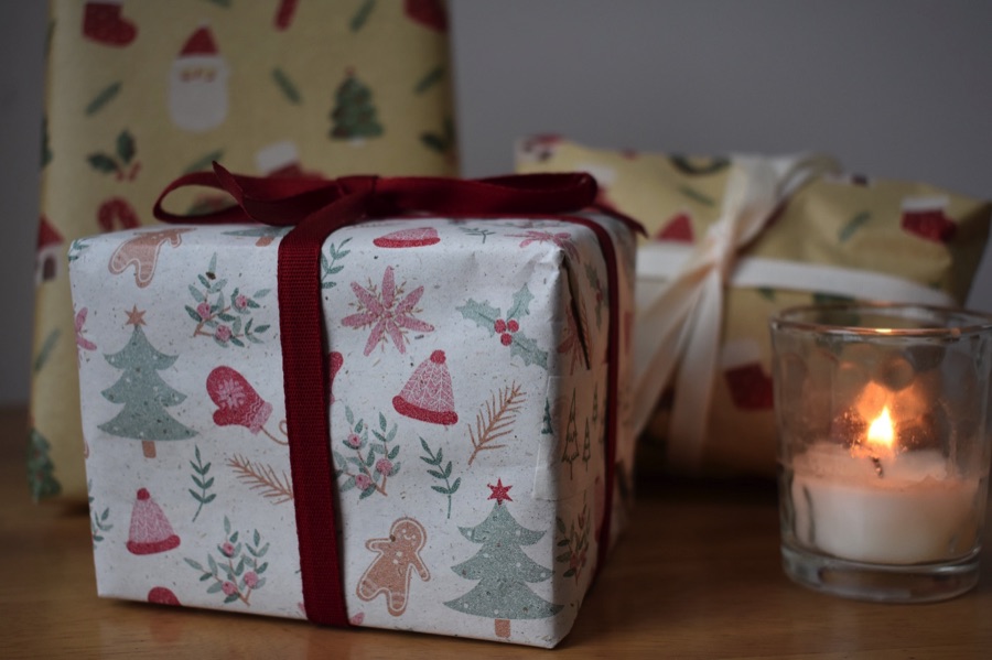 Cascayde wrapped gifts with candle